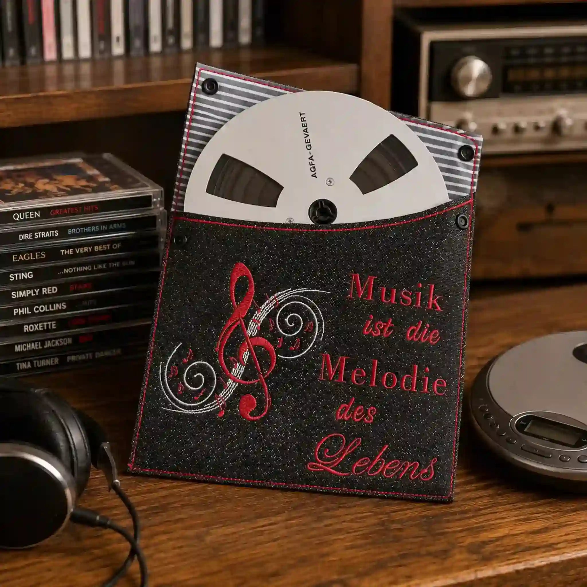 Stickdatei Spruch Musik mit Notenschlüssel