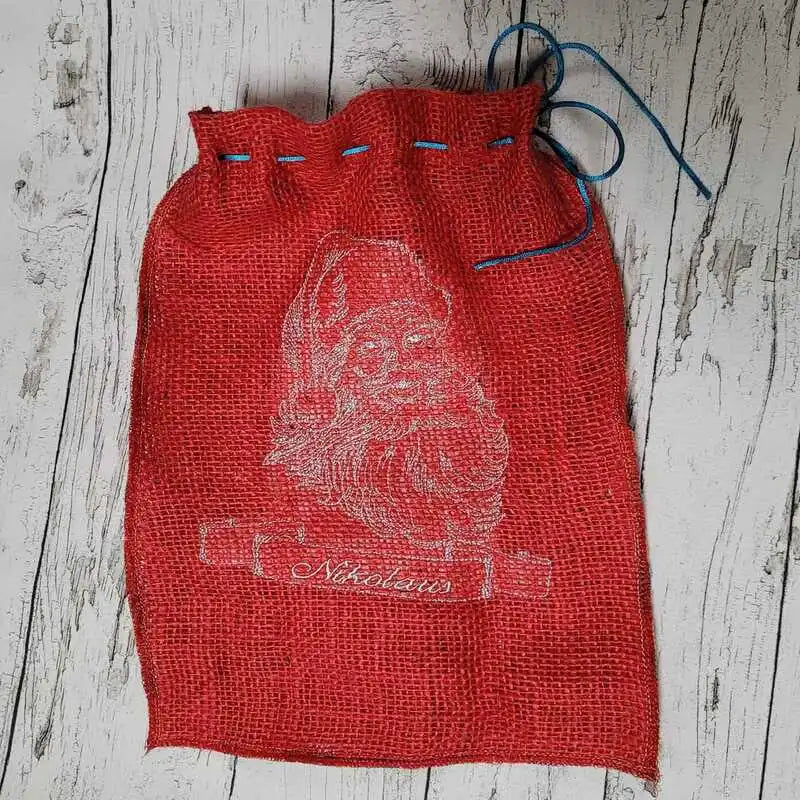 Stickdatei Santa Claus mit Schriftzügen von stiXXie by lajana