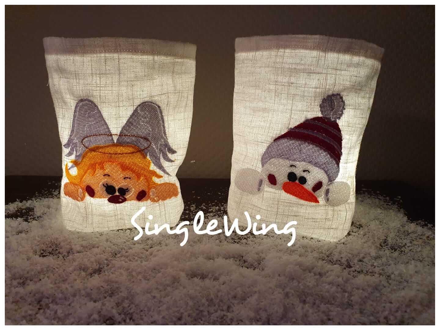 Stickdatei Schneemann und Engel von stiXXie by lajana
