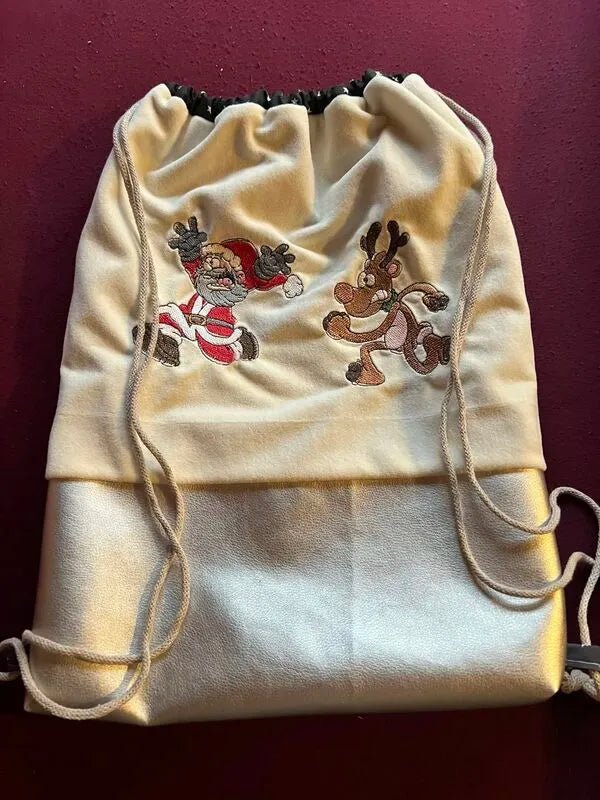 Stickdatei Running Elch und Nikolaus von stiXXie by lajana