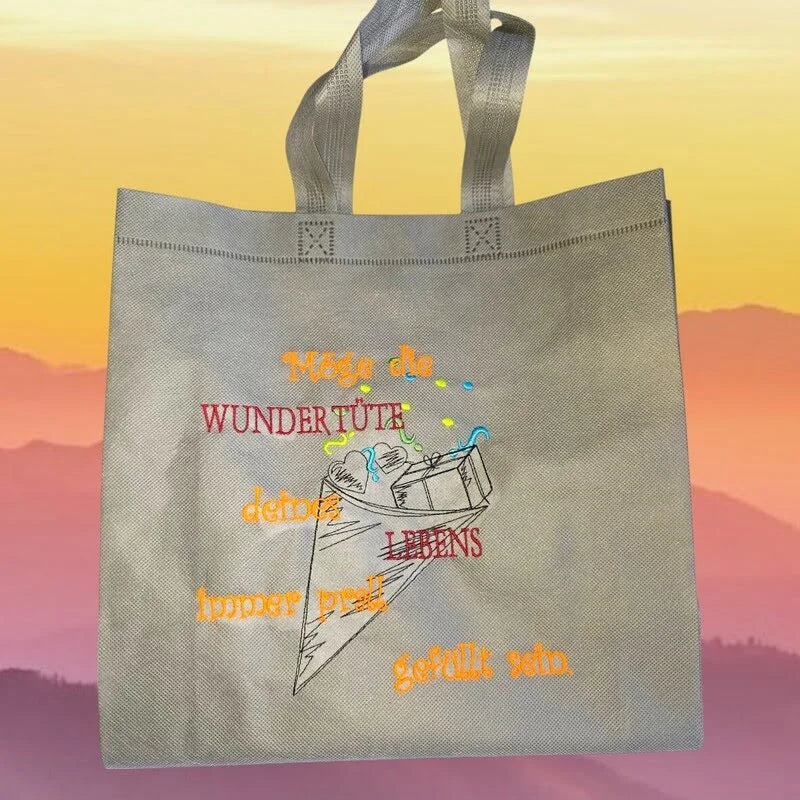 Stickdatei Wundertüte mit Spruch